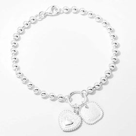 Sterling Silver Ball Bracelet With Charms