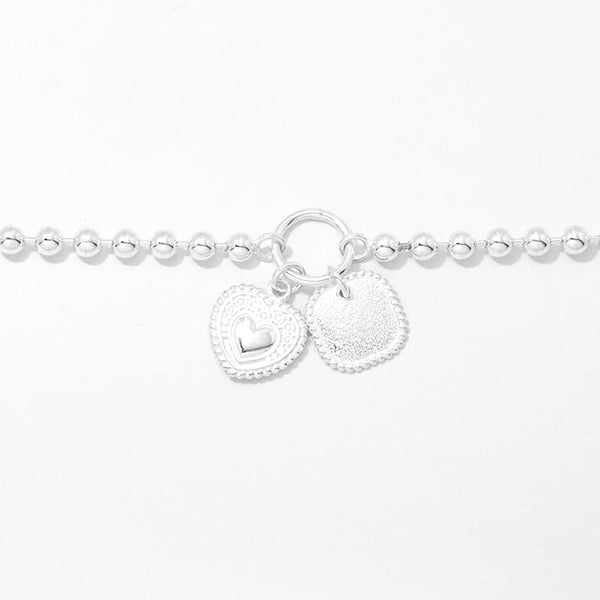 Sterling Silver Ball Bracelet With Charms