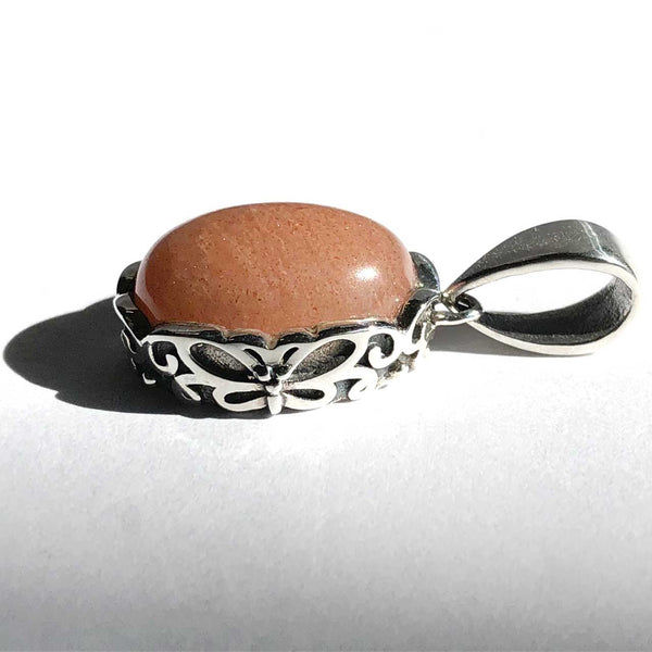 Sunstone Pendant with Butterfly Pattern on Side Gallery