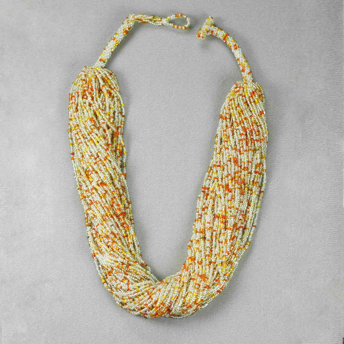 Multi Strand Orange Tone Potay Necklace